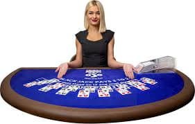 Live dealer studio with multiple camera angles broadcasting blackjack table